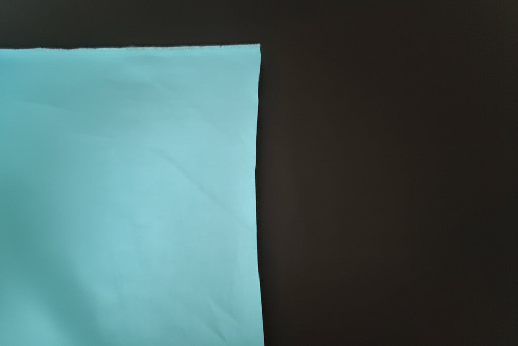 Premium Waterproof Rubber Bonded Cotton Fabric – Black & Ocean Blue (2-Ply)